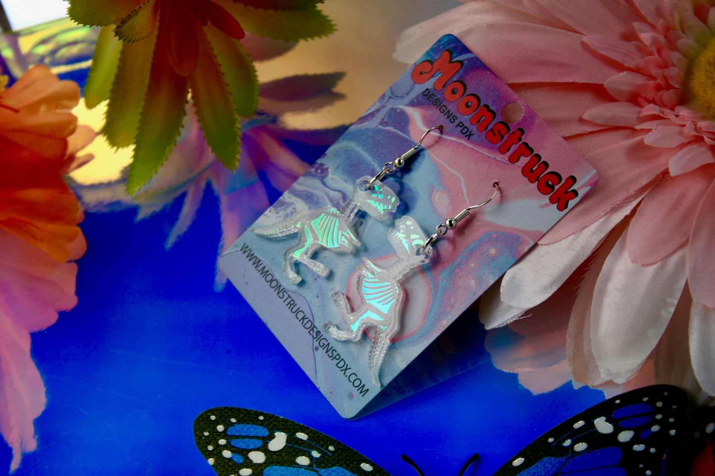 Wholesale- Dinosaur Skeleton Earrings - Halloween Iridescent Mirrored Spooky Hallows Eve Skull Undead Lightweight Hypoallergenic Reflective Mirrored Rave Festival Party Wear